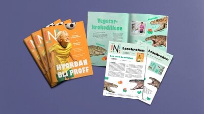 En bunke Nysgjerrigper-bladet 2-20 med artikkel om vegetarkrokodiller